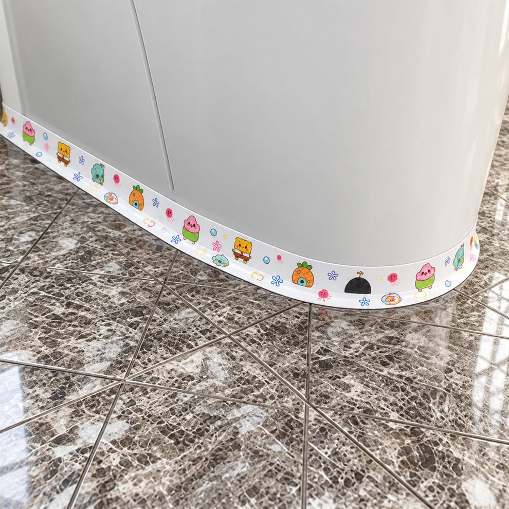 Sealing tape around the base of a toilet on a tiled floor