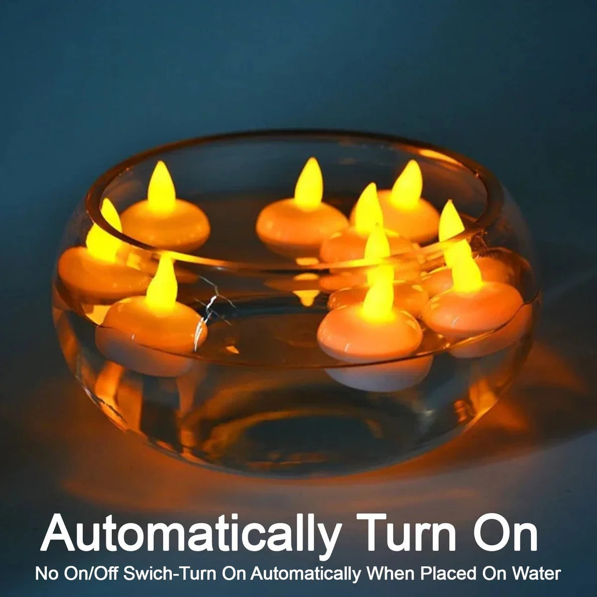 Floating LED candles glowing in water