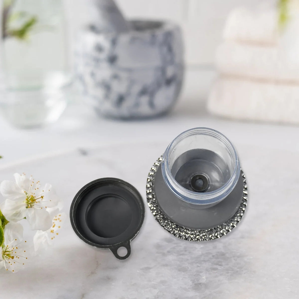 Palm brush with the top open to refill dish wash
